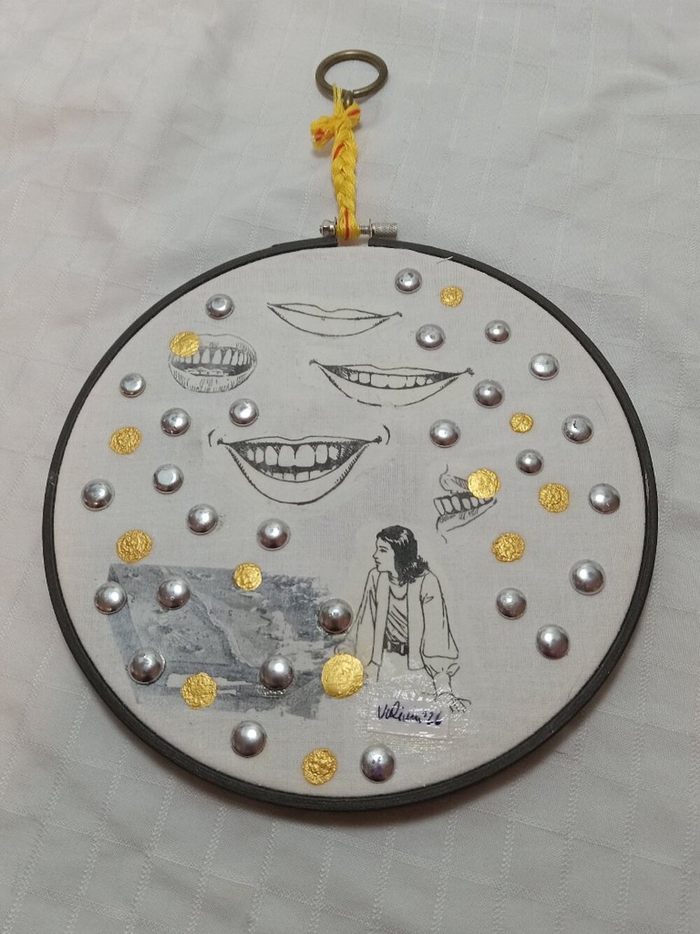 Handmade prints of old magazines on cotton & mixed media in a cross-stitch hoop